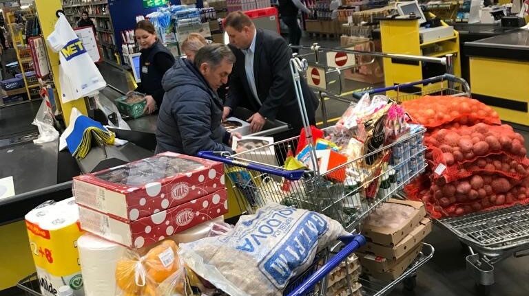 Our donations at work: Pastor Ivan and his team purchasing groceries for refugees (daily cost of $300+)